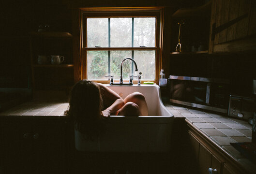 woman in sink