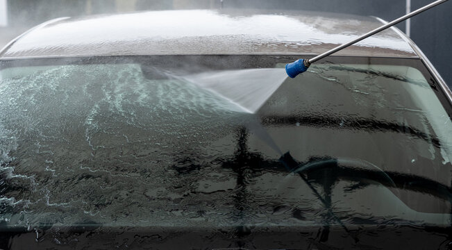 Carwash service, washing car in professional auto service