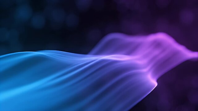 Abstract flowing light in blue and purple hues with a dark background.