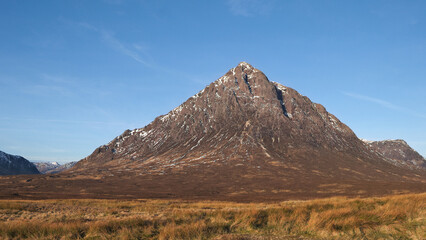 Stob Dearg, the principal peak of Buachaille Mor in spring sunshine. Seen from Rannoch Moor just off the A82 road. Glencoe, Lochaber, Scottish Highlends. © David