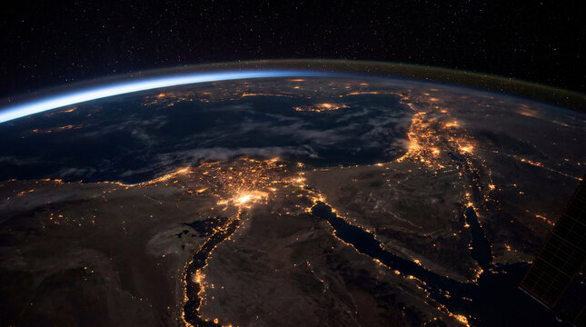 Nighttime view of Earth showing Mediterranean and Middle East city lights from orbit