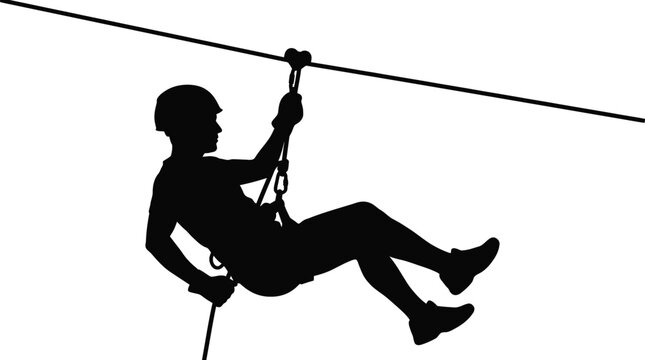 Black silhouette of a person wearing a protective helmet riding a fast metal zip line cable