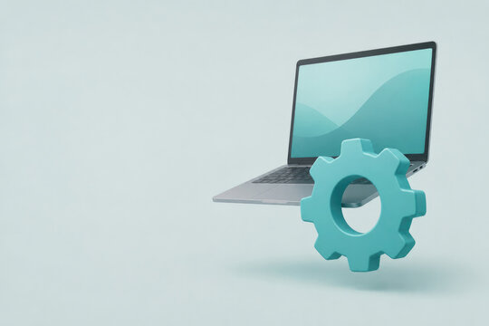 A turquoise gear stands beside a laptop computer. Space for text.