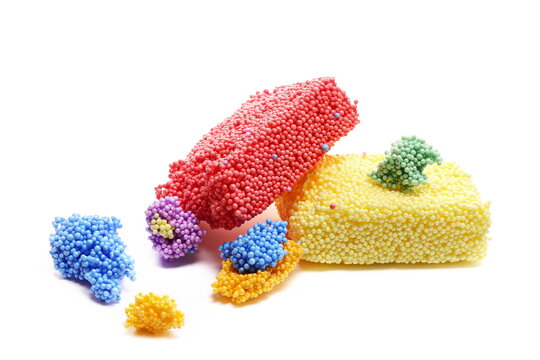 Colorful sticky styrofoam balls, toy modelling foam shape, soft and lightweight, isolated on white background
