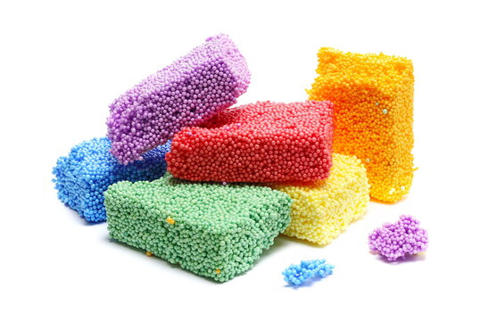 Colorful sticky styrofoam balls, toy modelling foam shape, soft and lightweight, isolated on white background
