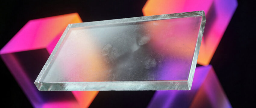Futuristic abstract background with a frosted glass rectangle and vibrant neon geometric blocks reflecting pink and purple light.