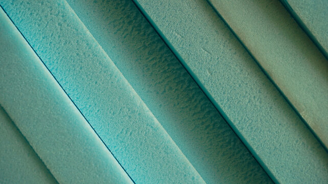 Abstract pattern of blue polystyrene foam insulation boards