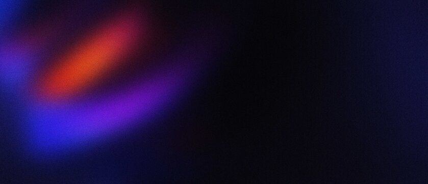 Abstract bokeh lights with vibrant blue and orange hues against a dark background