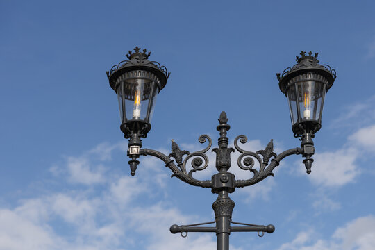 Vintage street lantern close up against blue sky in Truskavets Ukraine