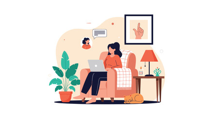 Fototapeta premium Freelance woman working from home on a laptop while relaxing in an armchair with her sleeping cat right beside her.