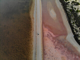 Naklejka premium Australia, Lake MacDonnell in Eyre Peninsula is the most famous salt lake in South Australia. This stunning lake near Penong has an incredible pink colour, making it a truly unique sight to see.