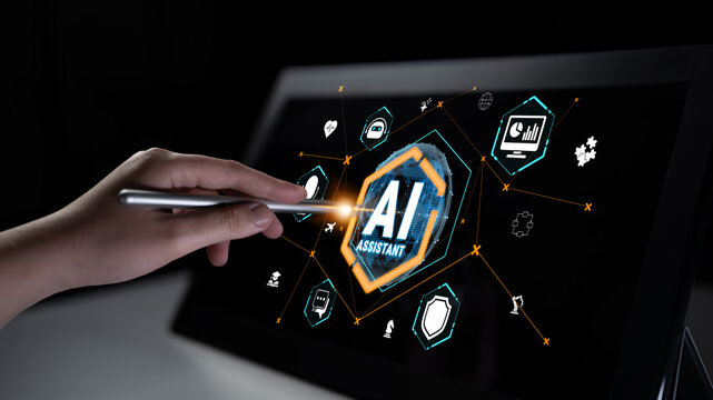 Hand Using Stylus on Touchscreen Display with AI Assistant Icons and Graphics Representing Modern Technology in Dark Environment Quark.