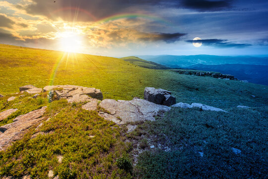 carpathian mountain landscape on summer solstice. amazing background for outdoor adventure at twilight. transcarpathia green hill with rocks. day and night time change metaphor