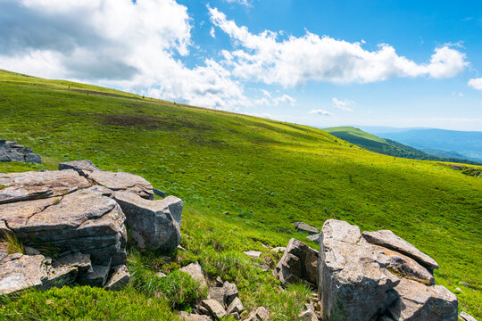 carpathian mountain landscape in summer. amazing background for outdoor adventure. transcarpathia green hill with rocks. sunny day with blue sky