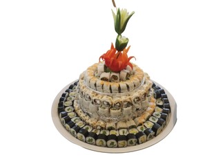Sushi cake platter displaying varied maki rolls © fiore26