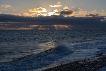 Obraz premium Winter seascape with sun rays at Notsuke Peninsula, Hokkaido / 光芒が差し込む北海道・野付半島の冬の海景