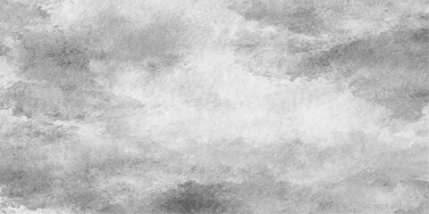 Monochromatic watercolor clouds drift across the sky, creating a serene and atmospheric backdrop with soft, blended textures. © jaduuu