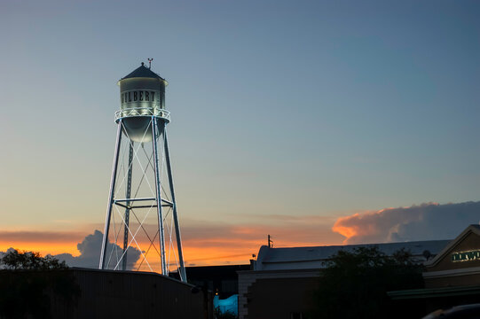 Retro water tower in city of Gilbert Arizona at night