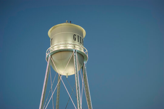 Water tower at night in city of Gilbert Arizona