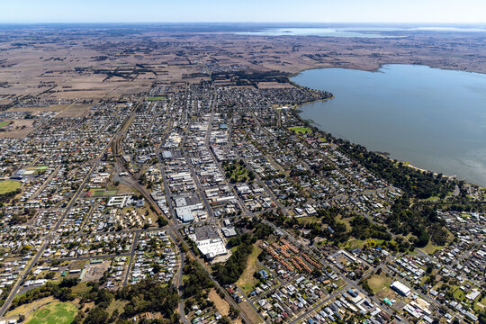 Colac aerial view of suburban housing and commercial district and retail shops, Victoria Australia
