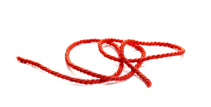 Red string, rope isolated on white background, side view, design element