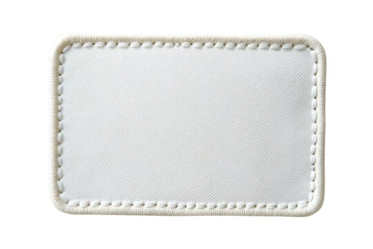 Clean blank white fabric patch with elegant rounded corners and a finely detailed stitched edge texture, ideal for apparel branding, clothing labels, or textile design mockups&nbsp;