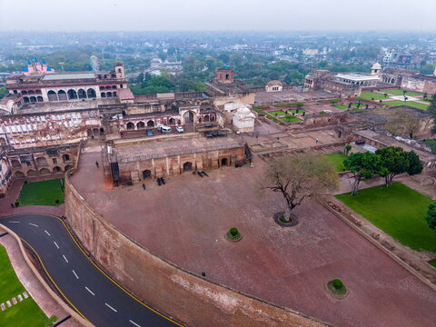 Aerial view of Lahore Fort featuring historic Mughal architecture, expansive courtyards, stone walls, and manicured lawns in Lahore, Punjab, Pakistan.