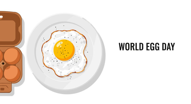 A fried egg on a white plate next to an open carton of eggs for World Egg Day.