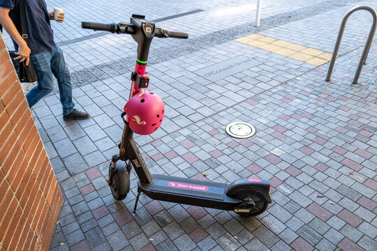 Shared e-scooter parked on footpath, part of Auckland's growing micromobility network, Auckland, New Zealand, November 2025.