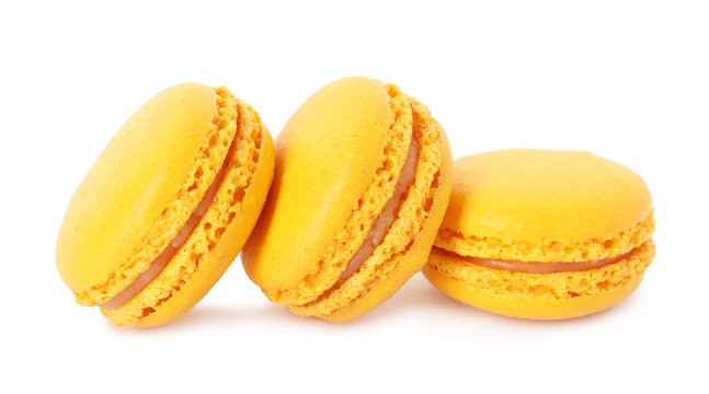 Yummy macarons. Sweet sandwich cookies with filling isolated on white