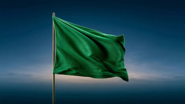 Dark green flag fluttering against a dusk sky