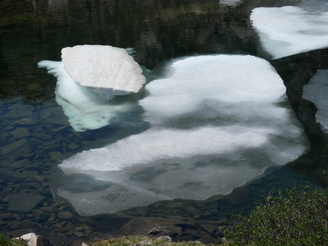 Melting lake ice floating on Blue Lake in late June, Indian Peaks Wilderness, Colorado