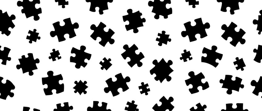 Scattered black puzzle pieces on white background, seamless pattern, abstract concept