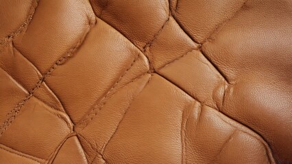 Naklejka premium Brown quilted leather texture