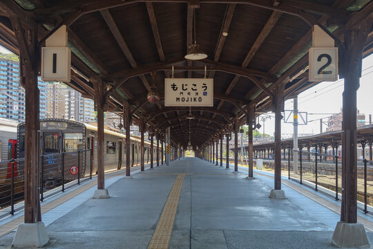 Mojiko Station name sign on the platform in Fukuoka, Kyushu, Japan, May 12, 2026