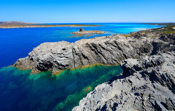 View of Cala Squalo rocky cove from Capo Falcone in the north of Sardinia in the Mediterranean Sea, Italy