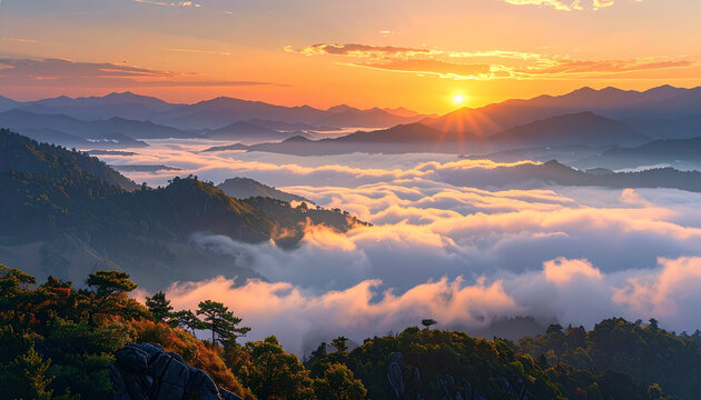 Majestic sunrise over mountain peaks with sea of clouds