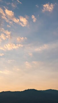 Beautiful evening clouds time-lapse, soft purple and pink sky background.