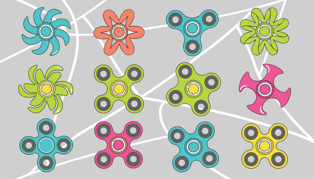 Variety of colorful fidget spinners in different shapes and designs displayed against a grey patterned background.