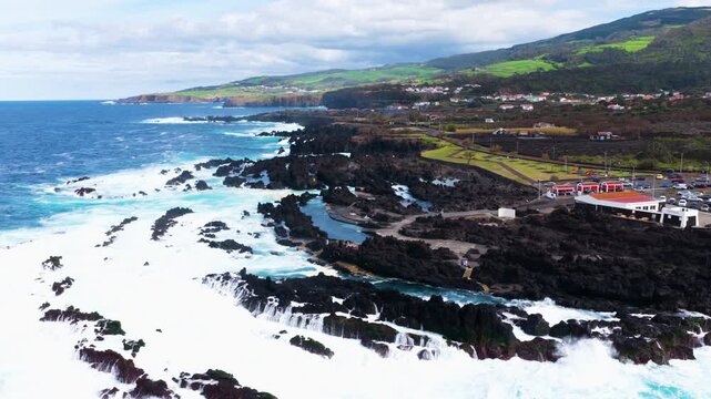 Volcanic Coastline And Natural Swimming Pools Of Biscoitos On Terceira Island In Azores, Portugal. - aerial shot