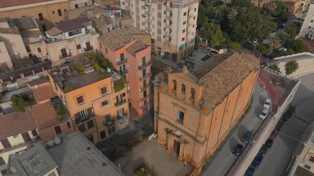 Church of St. Peter in Agrigento, Sicily, golden hour, aerial circle pan reveal