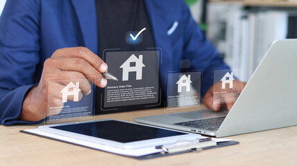 Business professional managing digital real estate listings on a virtual property platform with...