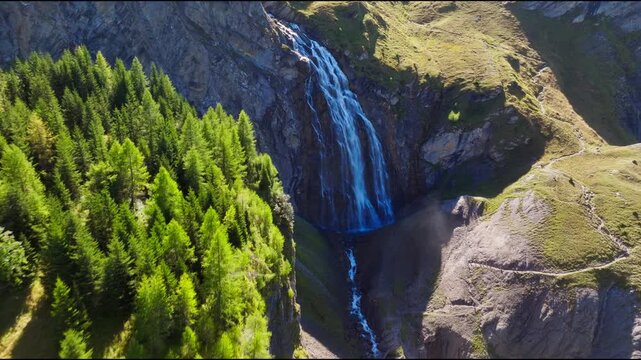 Scenic views of Engstligenalp in the Swiss Alps. Expansive alpine meadows, rugged mountain peaks, dramatic skies and untouched natural landscapes in one of Switzerland's most beautiful alpine regions.
