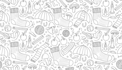 Fototapeta premium Cozy winter doodles featuring warm knit socks, apples, scarves, candles, and mushrooms in a black and white pattern.