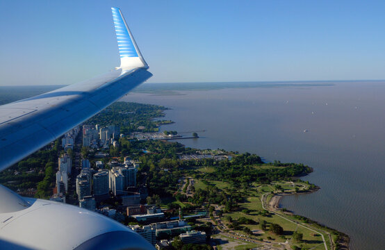 Aerolineas Argentinas Boeing 737 800 wing over Buenos Aires suburbs, Argentina	
