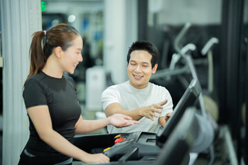 Fototapeta premium The modern gym interior features dumbbells, barbells, treadmills, and strength-training equipment, promoting exercise, muscle building, a healthy lifestyle, training, and physical fitness.