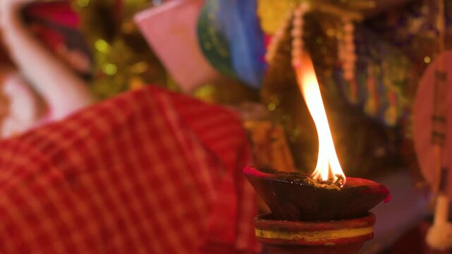 Oil Lamp Burning Before Goddess Durga Idol During Durga Puja in Kolkata