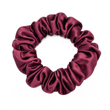 Burgundy silk scrunchie for hair isolated on white background