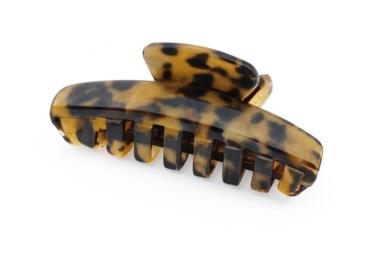 Tortoiseshell hair claw clip isolated on white background