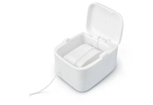 Dental floss container with white floss isolated on white background